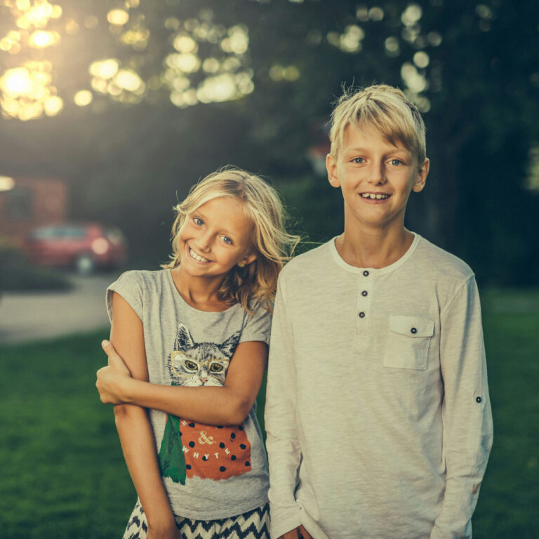 Photo by Janko Ferlic: https://www.pexels.com/photo/boy-standing-beside-girl-outdoors-590472/
